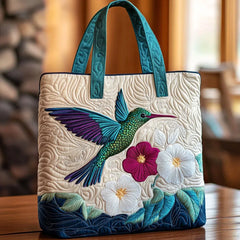 Gewatteerde shopper met kolibrie bij een witte bloem